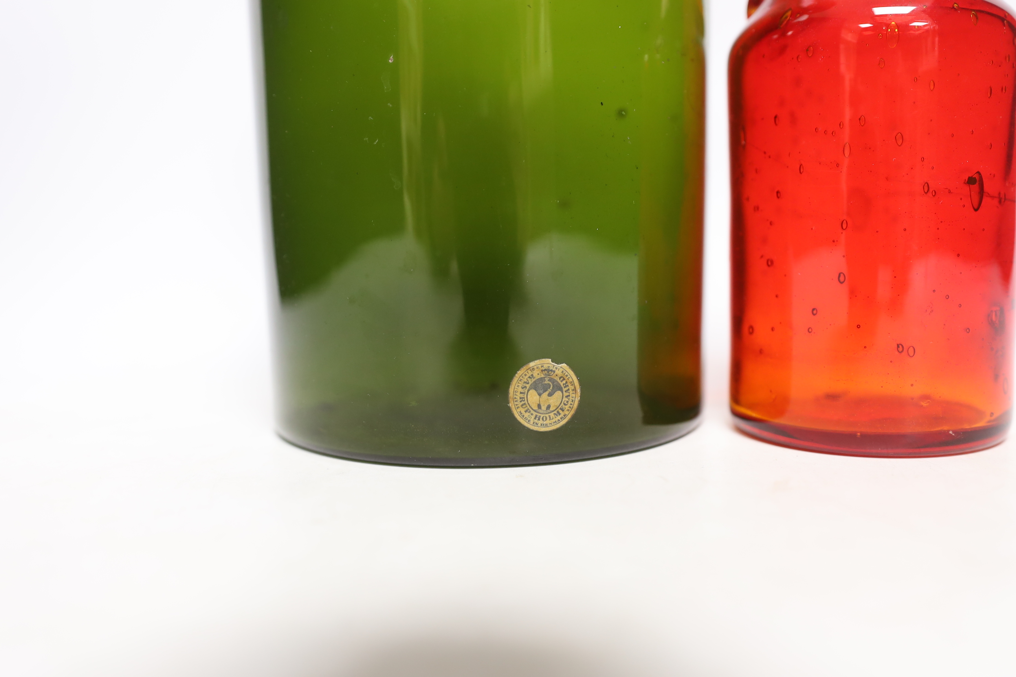 Eric Hogland, a ruby glass bottle and a Holmegaard bottle, 30cm high